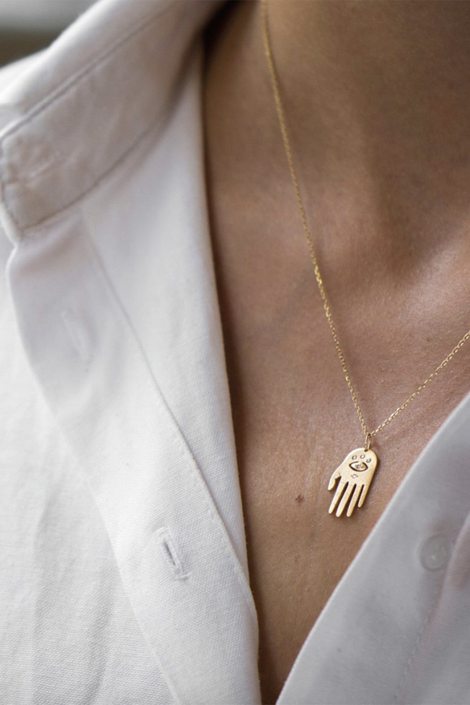 SMALL DHARMA’S HAND NECKLACE