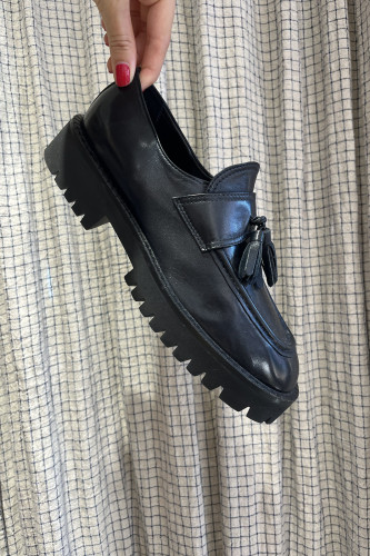 Mocassin pompom