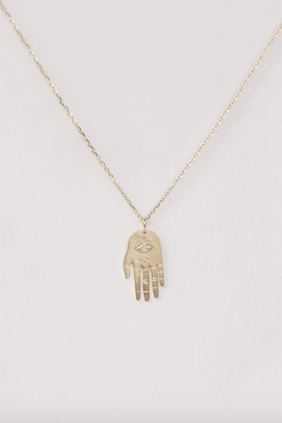 SMALL DHARMA’S HAND NECKLACE